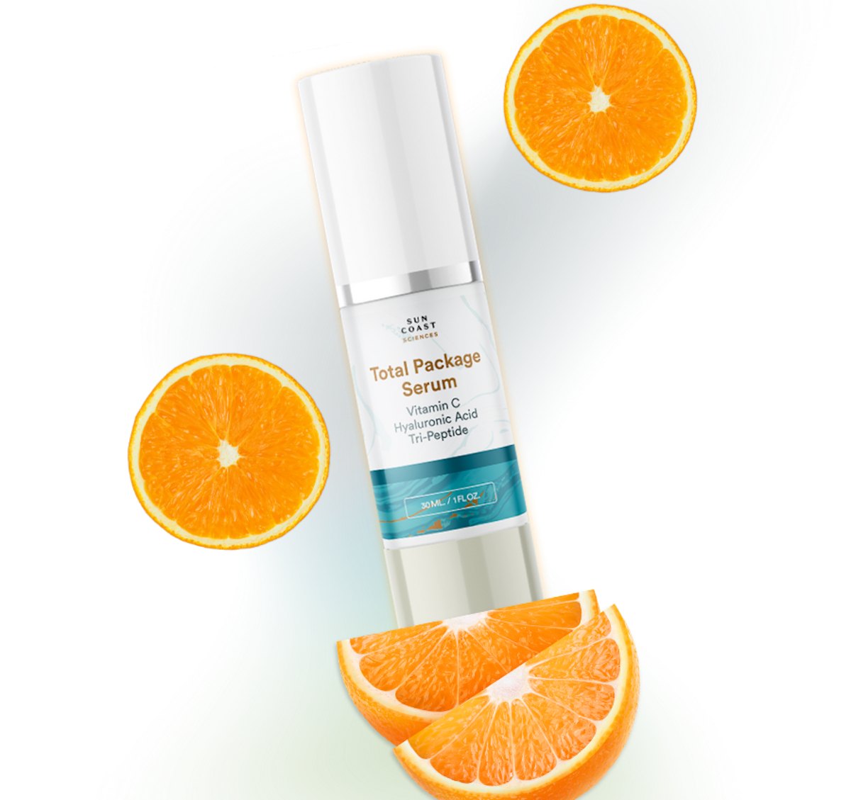 Total Package Serum bottle with fresh orange slices